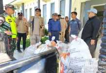 Bupati Pessel Salurkan 750 Kg Beras untuk Warga Terdampak Banjir di Kecamatan Batang Kapas